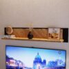 NIKOMEDES Wall Shelf 140cm in Spica Oak, Matt Black & Bartex Oak - Image 4