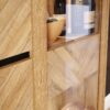 NIKOMEDES Sideboard in Spica Oak, Matt Black & Bartex Oak - Image 7